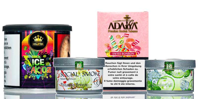 ine Auswahl verschiedener Shisha-Tabak-Produkte, darunter Marken wie Adalya, Social Smoke und Holster.